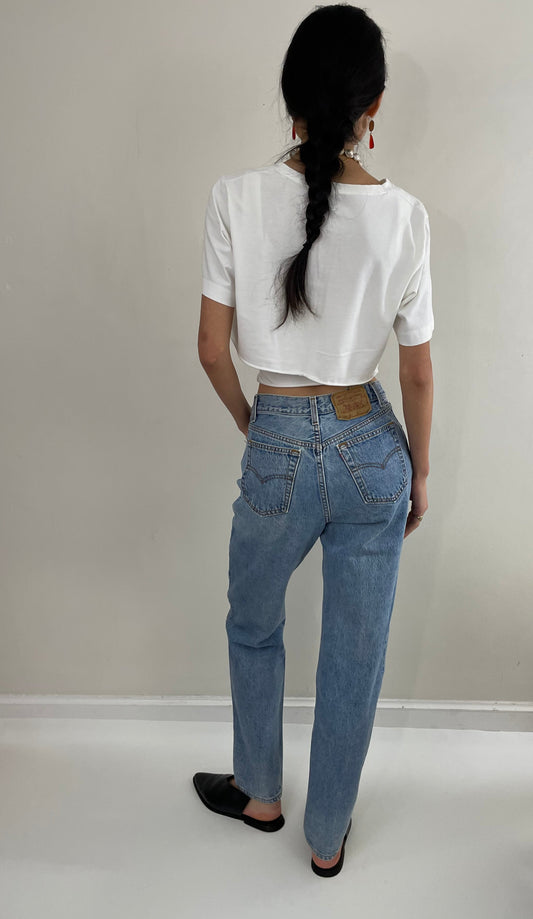 vintage Levis 501 button fly made for women high waisted faded Levis jeans made in USA size 27 x 32