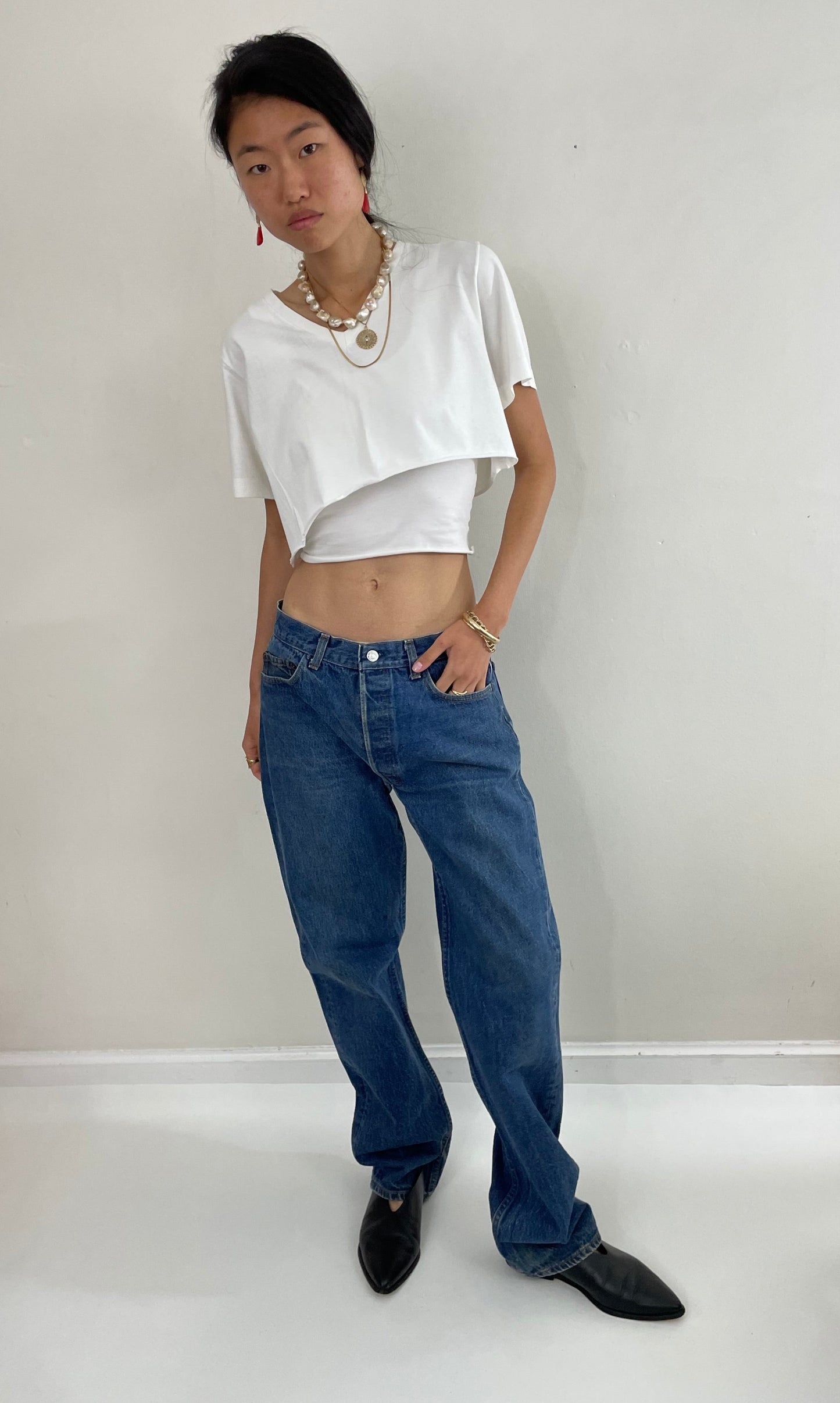 vintage Levi's 501 0115 medium wash button fly tall boyfriend jeans made in USA size 33 x 34