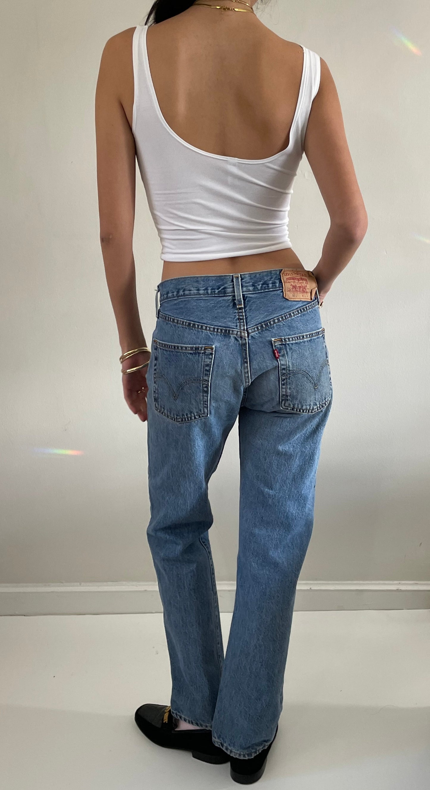 vintage Levi's 501 button fly medium wash mid rise 90s Levis jeans size 30