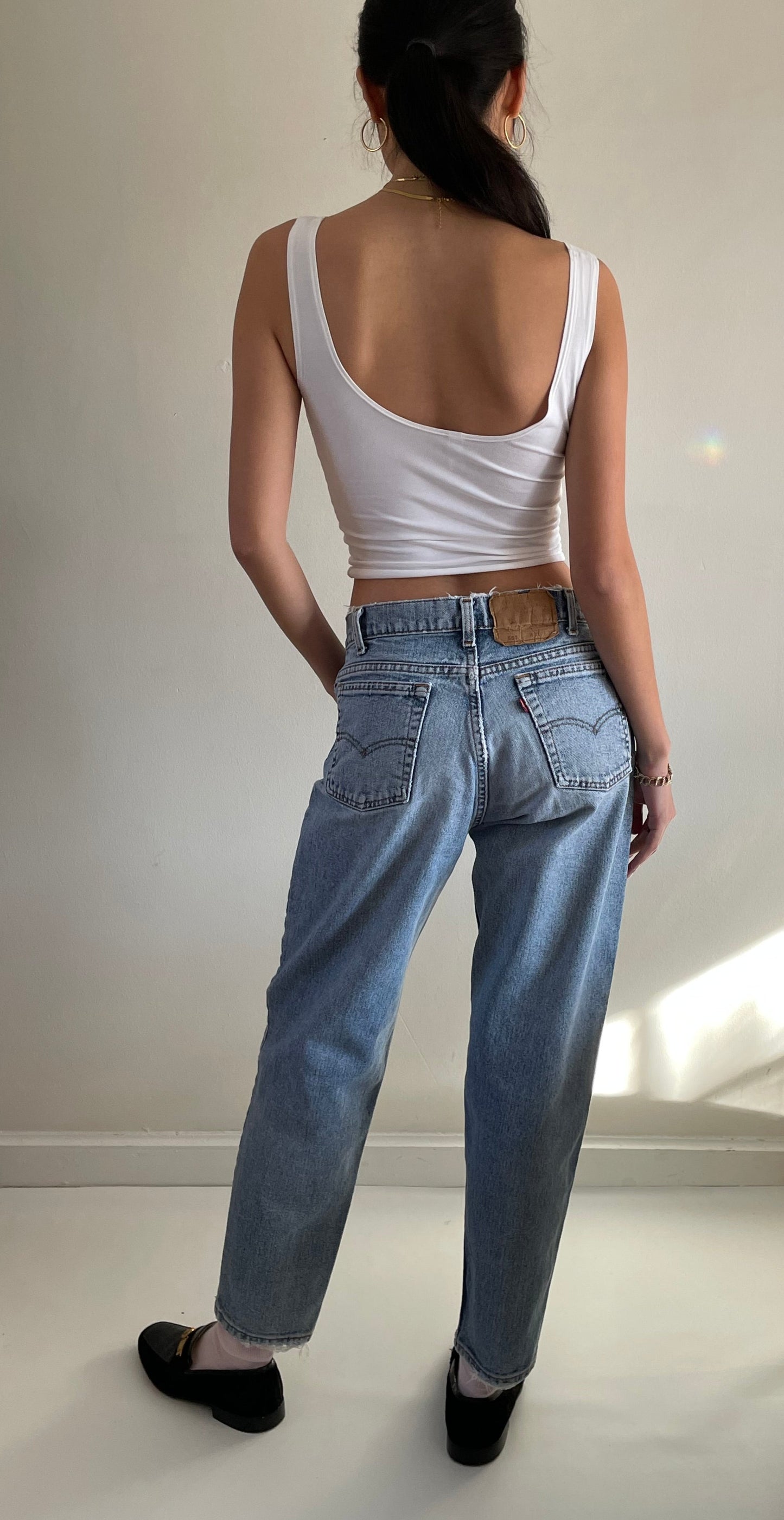 vintage Levis 560 frayed faded high waisted zipper fly Levi's jeans made in USA size 29