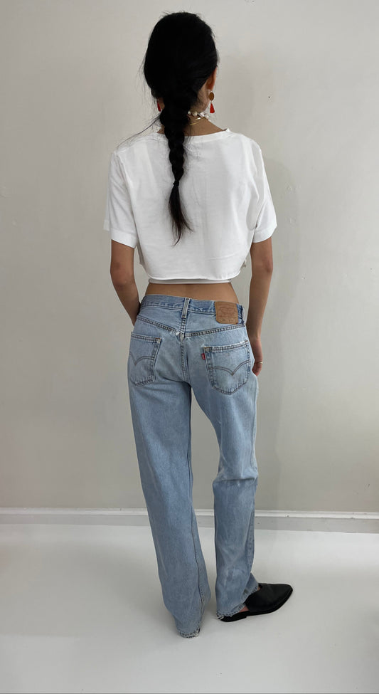 Vintage 80s Levi's 501 soft faded torn shrink to fit frayed bleached Levis tall jeans size 31 x 32