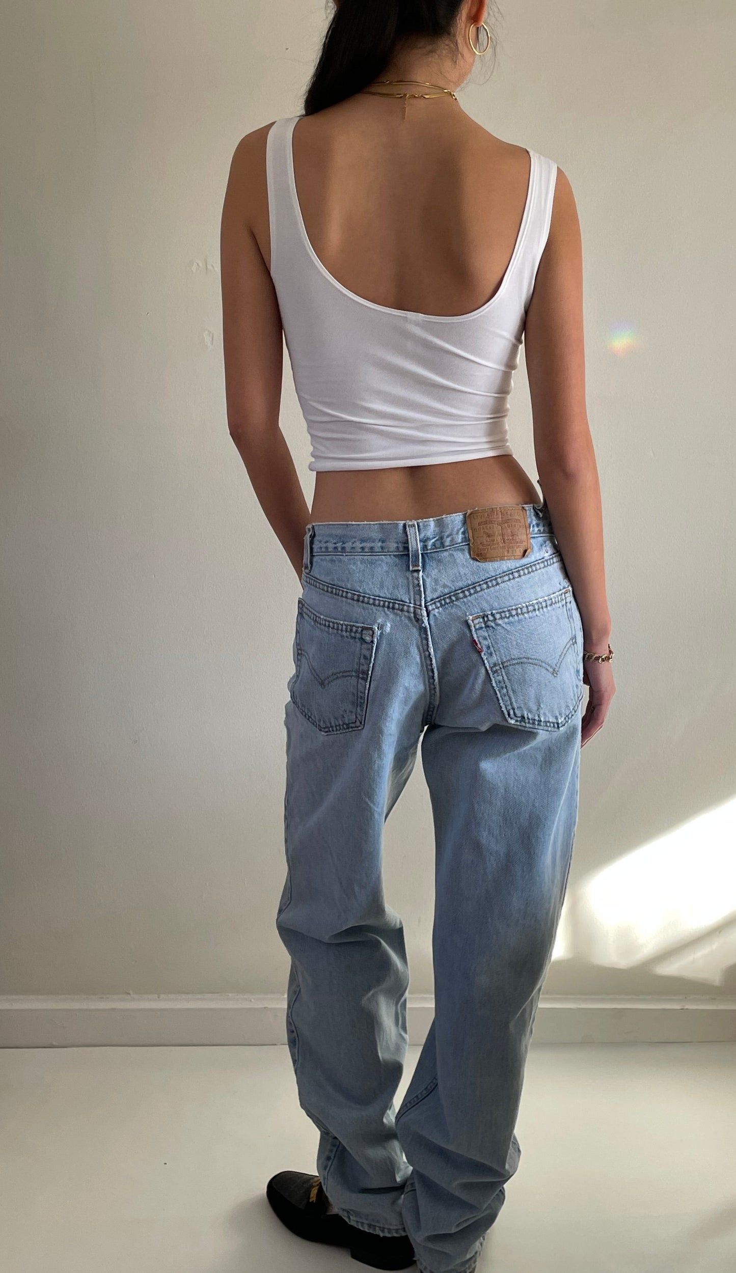 vintage Levi's 550 light wash high waisted zipper fly faded slouchy baggy Levis boyfriend jeans size 31